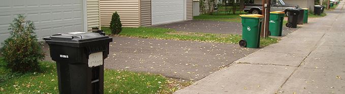 Street with Recycling and Garbage bins
